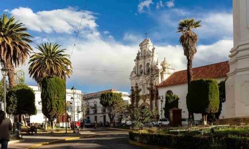 church-hospital-near-the-obelisk-of-the-freedom-tower-monument-in-sucre-bolivia-stockpack-adobe-stock-scaled